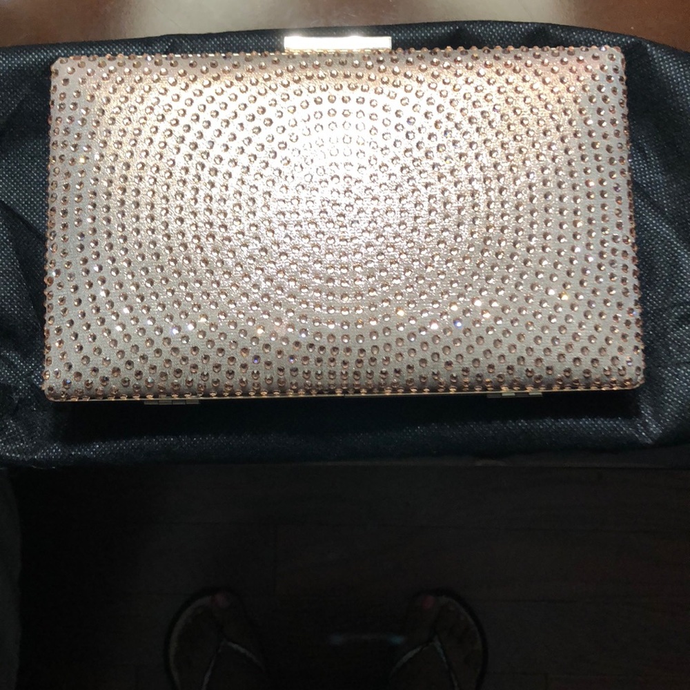 Brand new rose gold clutch